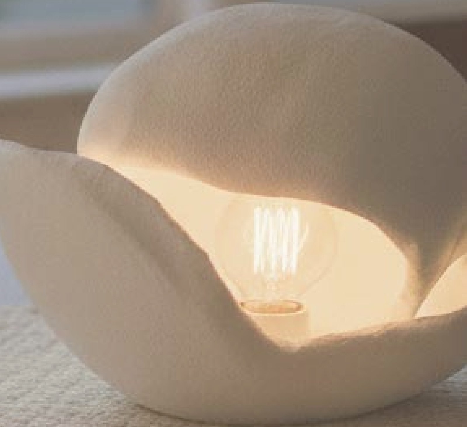 Lumina, a hand-sculpted lamp glowing from within